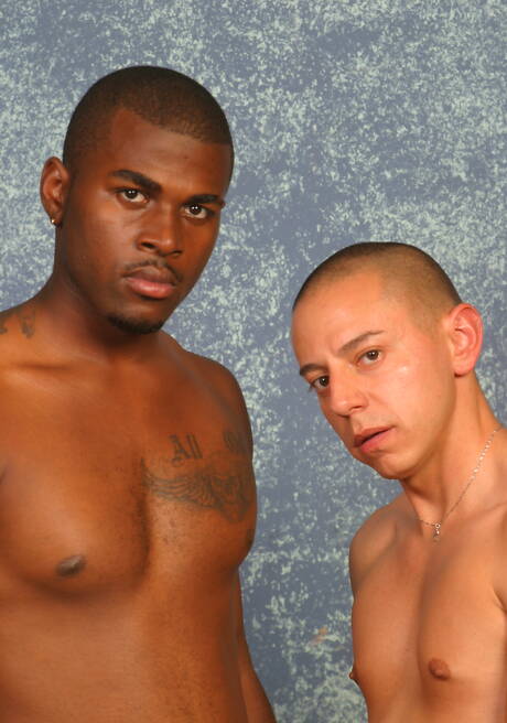 Young dude Adrian and ebony stud Blackhawk have a good interracial oral sex