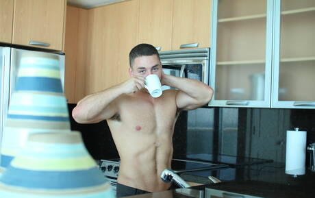 American young Leon Knight make a love in kitchen