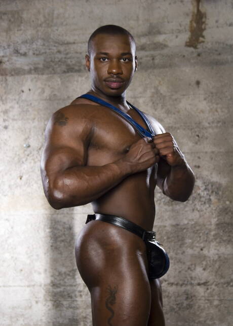 Ebony hunky guy Marc Williams get naked and showing tight butt