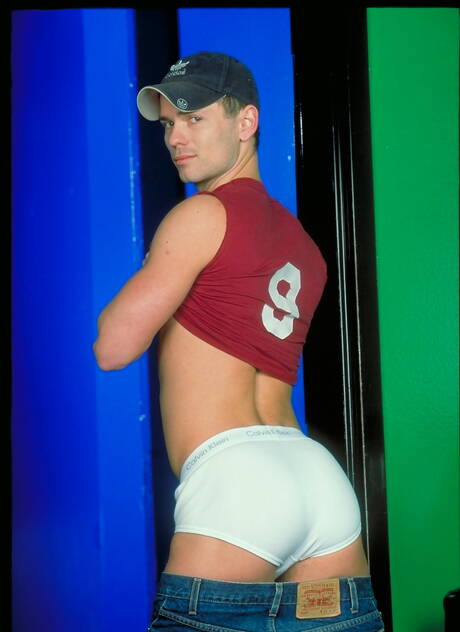 American beefcake Owen Hawk undressing and showing tight butt