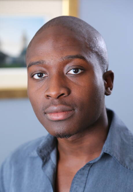 Black stud Kareem Williams posing naked and showing tight butt