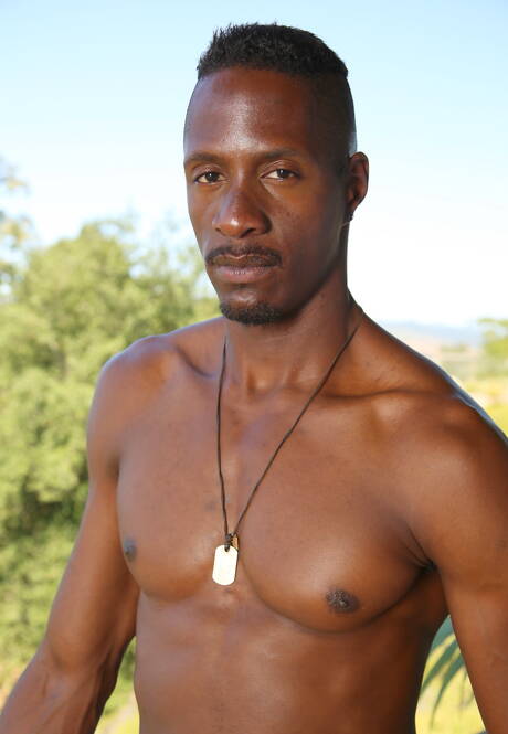 Ebony beefy Derek Maxum undressing and showing hot butt outside