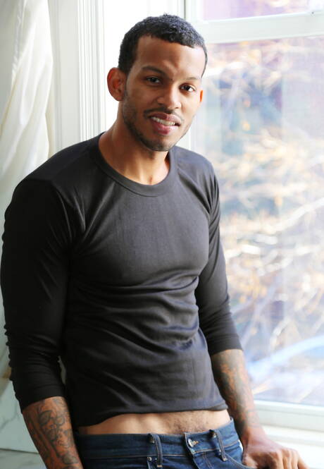 Black well-built Mike Mann shows a perfect body