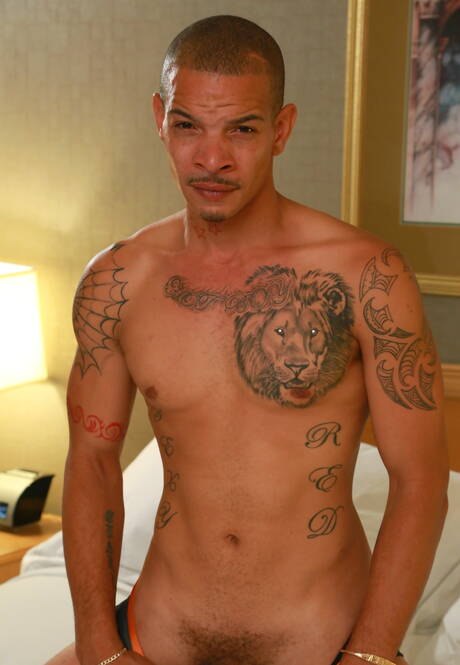 Ebony superstud Krave Moore and superstud Red A in interracial dick sucking scene