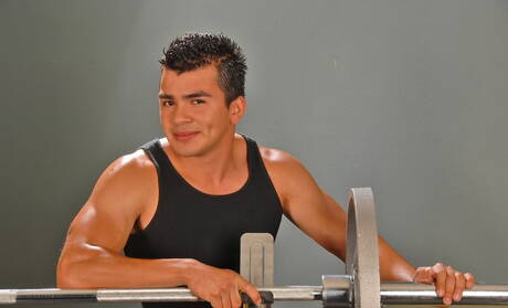 Mexican beefcake Mario Romo undressing and showing nice butt