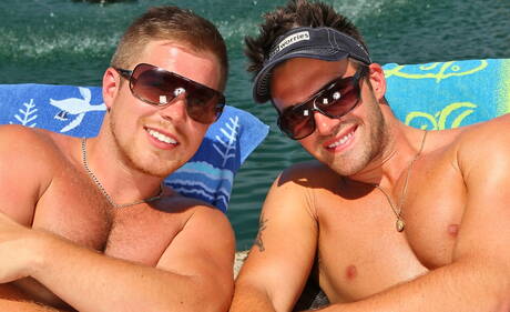 Canadian beefy Trystan Bull and canadian muscular Marko Lebeau in blowjob scene at pool