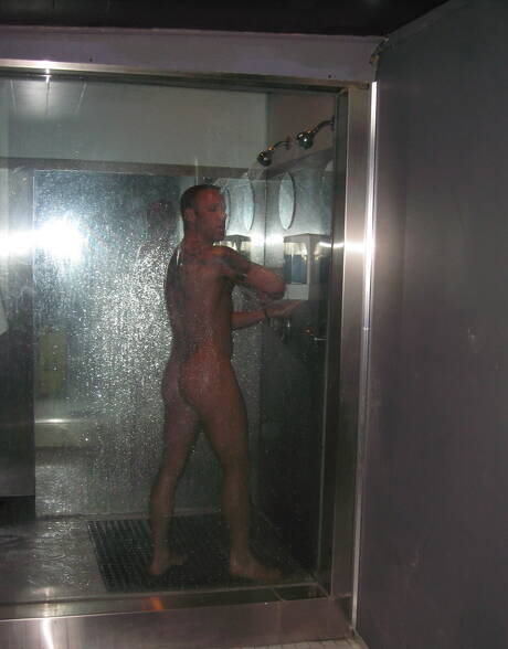 Canadian hairy bear Troy Punk and black strongman Nubius in interracial cock sucking scene in bath