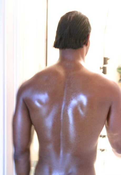 Black bodybuilder Tone playing with dick in bathroom