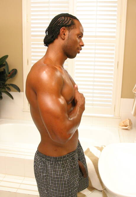 Black bodybuilder Tone playing with dick in bathroom