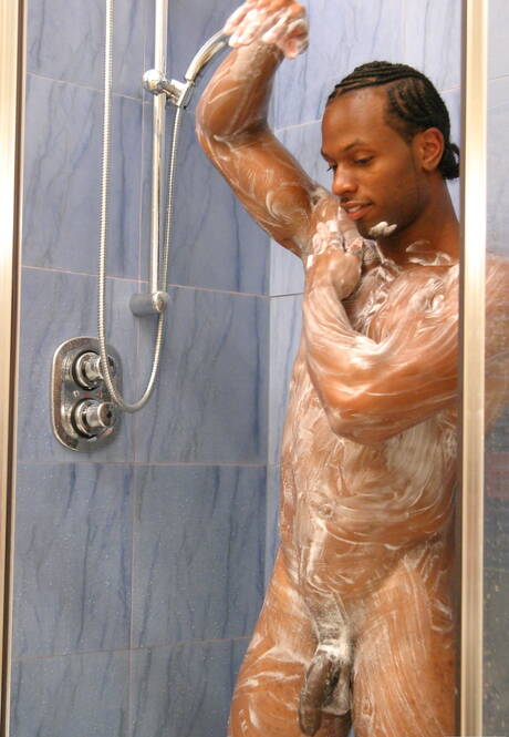 Black bodybuilder Tone playing with dick in bathroom