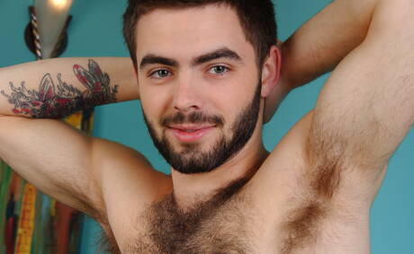 American otter Josh Long posing nude and showing tight butt