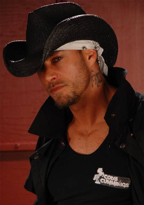 American strongman Cody Cummings posing naked and showing tight ass