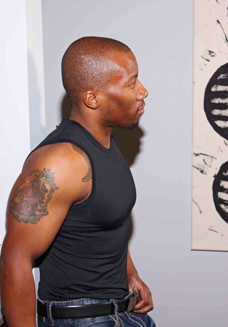 Black muscular Kai Adams posing nude and showing nice ass