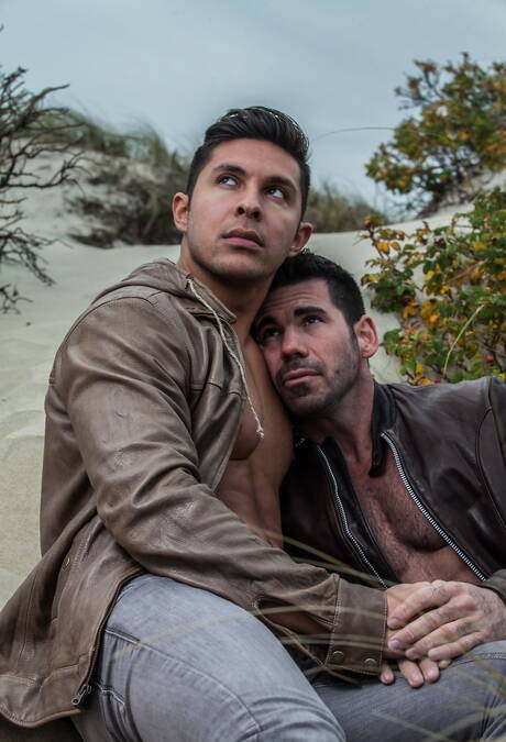Two american guys muscular Billy Santoro and bodybuilder Seth Santoro shows a muscle body on beach