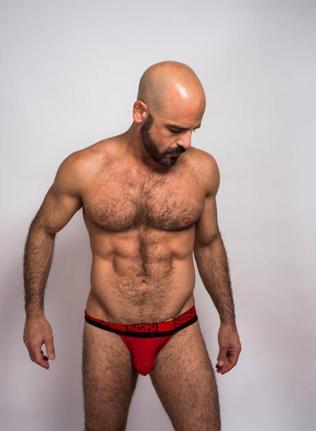 American otter Adam Russo shows a perfect body