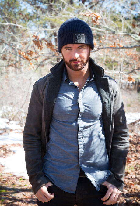 Irish bear Brendan Patrick undressing outdoor