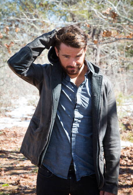 Irish bear Brendan Patrick undressing outdoor