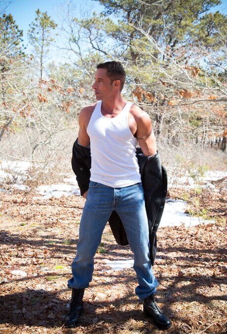 American muscular Nick Capra undressing outdoor