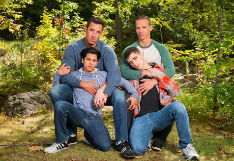 Icon Male: Hunk Nick Capra posing in jeans with young friends
