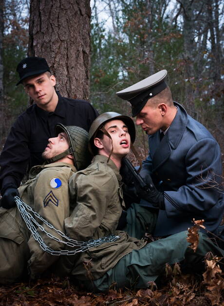 Military gays Ty,Sam, Trent and Alexander Gustavo posing and kissing outdoors