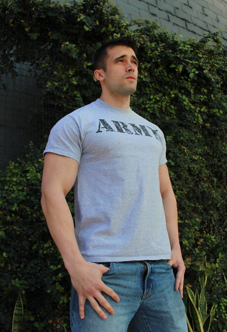 American muscular Mathias having a pleasure outside