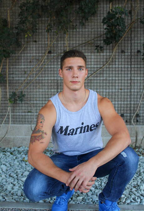 American strongman Spencer Laval playing with dick outdoor