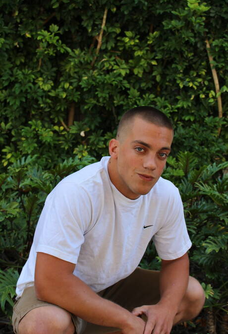 Young Scotty Dickenson undressing and showing tight ass outdoor