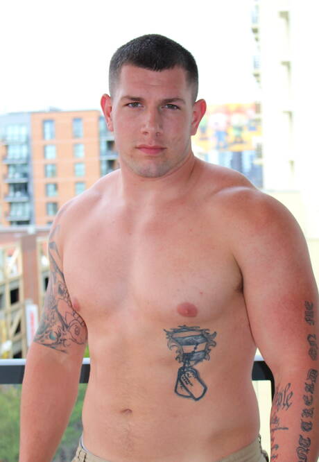 Muscular Jeremy Diesel teasing his cock outside