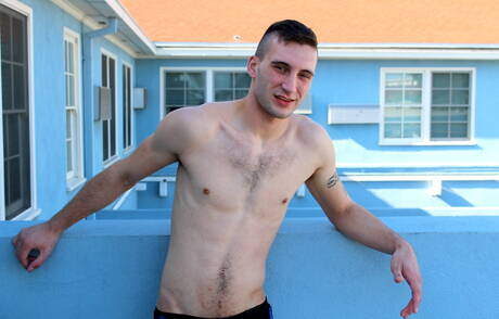 Husky guy Scott Millie shows a beautiful body outdoor