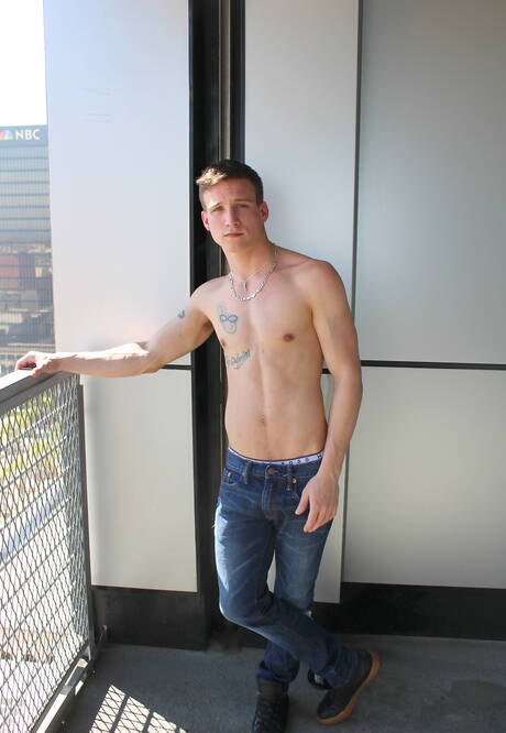 Stud Mike Hollister shows a muscle body outdoor