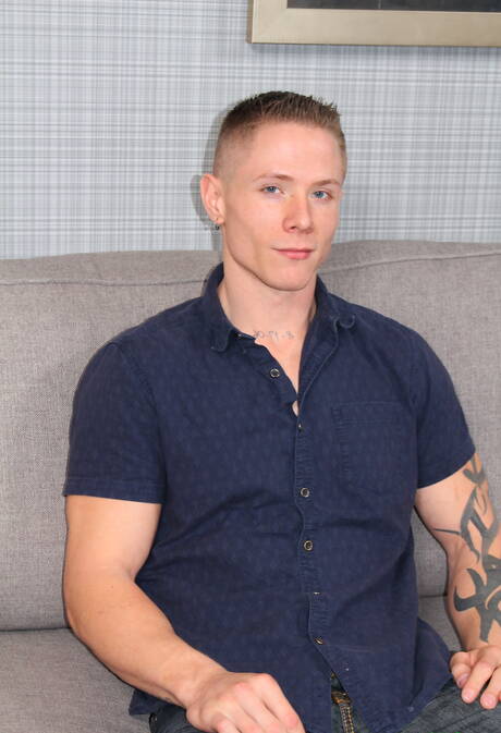 Muscular Guy Houston shows a muscle body outdoor