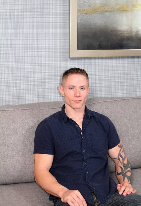 Muscular Guy Houston shows a muscle body outdoor