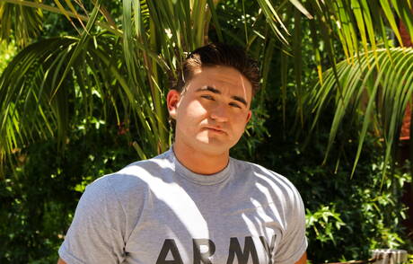 Muscular David Prime posing naked and showing tight butt outdoor