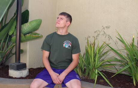 Superstud Dante undressing and showing tight butt outside