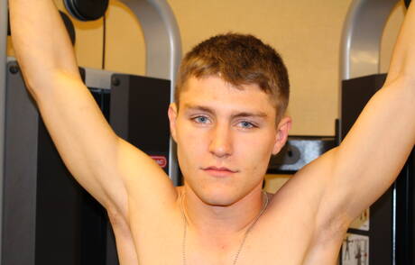 Superstud Dante undressing and showing tight butt outside