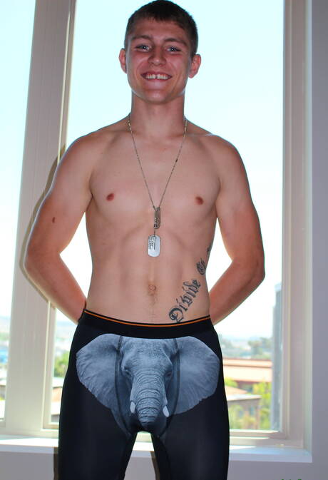 Superstud Dante undressing and showing tight butt outside