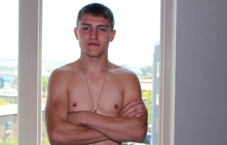 Superstud Dante undressing and showing tight butt outside