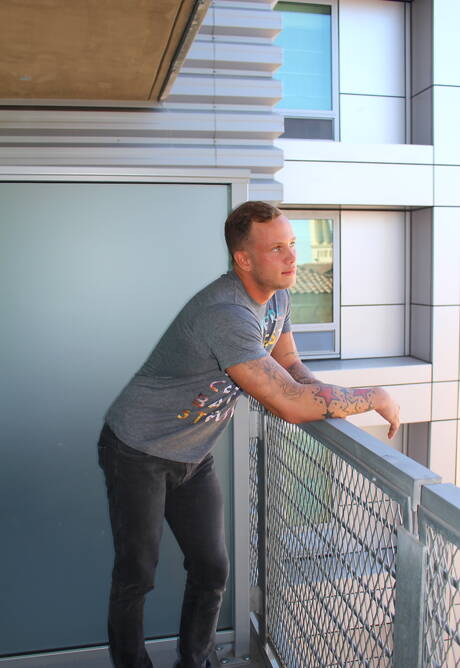 American hunk Zack Matthews shows a well-build body outside