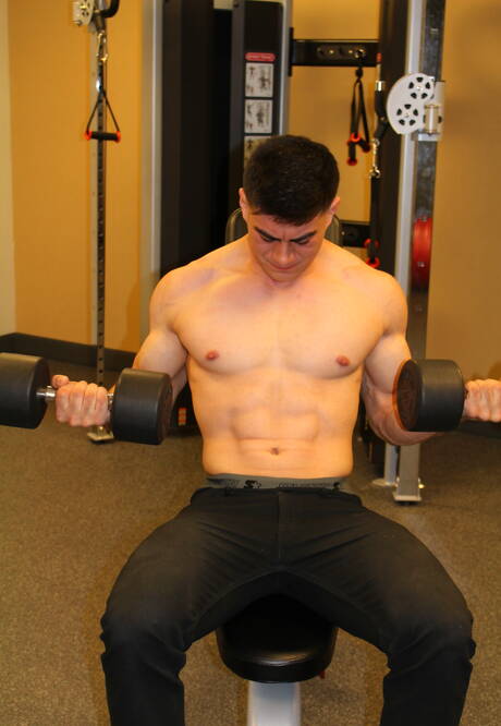 Bull Zach undressing and showing tight ass outside