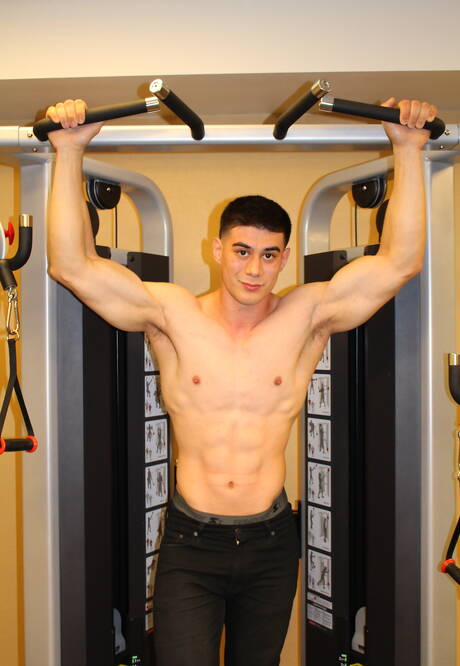 Bull Zach undressing and showing tight ass outside