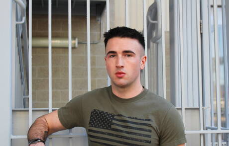 Superstud Jayce posing nude outside