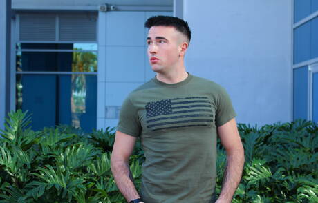 Superstud Jayce posing nude outside