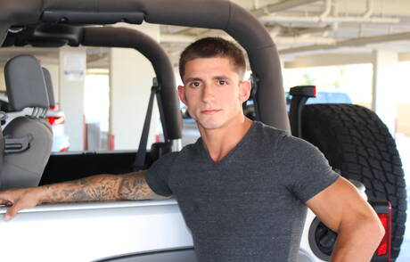 Latin bodybuilder Kevin Daniels posing naked and showing hot butt outdoor