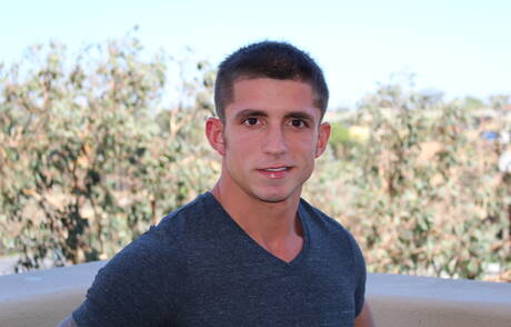 Latin bodybuilder Kevin Daniels posing naked and showing hot butt outdoor