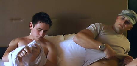 Husky guy Bryce and beefcake Ryan in blowjob scene