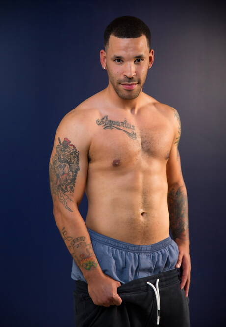 Latino bodybuilder Michael Blaze playing with cock