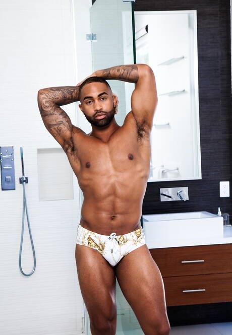 Nice american guys strong bull Seth Santoro and muscular Remy Cruze in interracial blowjob scene in bathroom