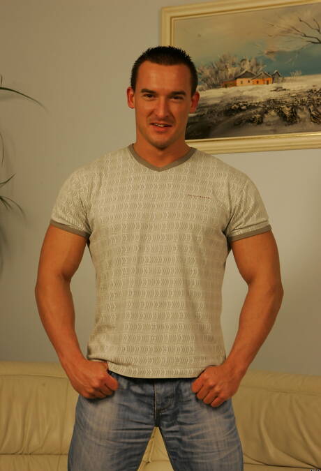 Bodybuilder Michael Troy undressing and showing tight butt