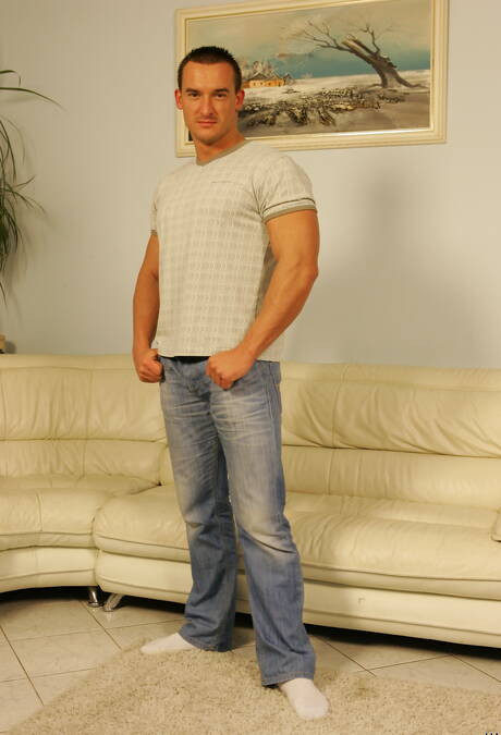 Bodybuilder Michael Troy undressing and showing tight butt