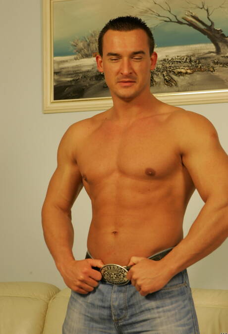 Bodybuilder Michael Troy undressing and showing tight butt